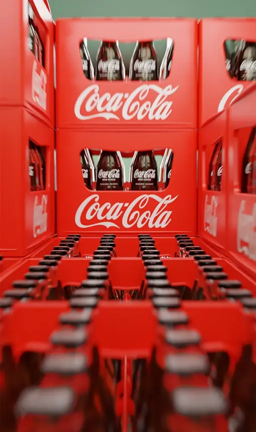 Stacked red Coca-Cola crates filled with bottles.